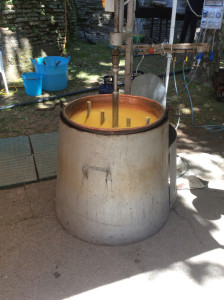 A large copper pot with polenta; just a few more minutes...