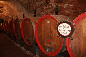 The wine is aged in oak barrels in the cellar of the underground city.